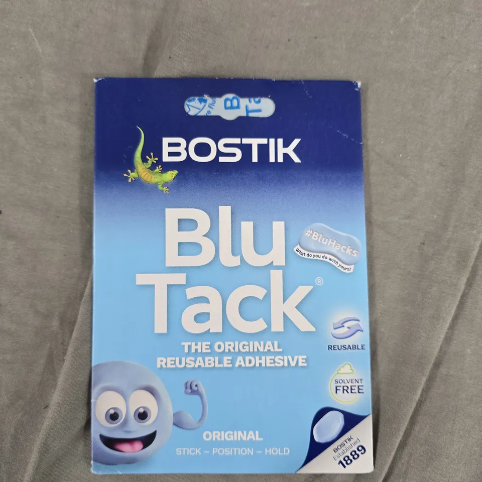 APPROXIMATELY 32 PACKETS OF BLU TACK