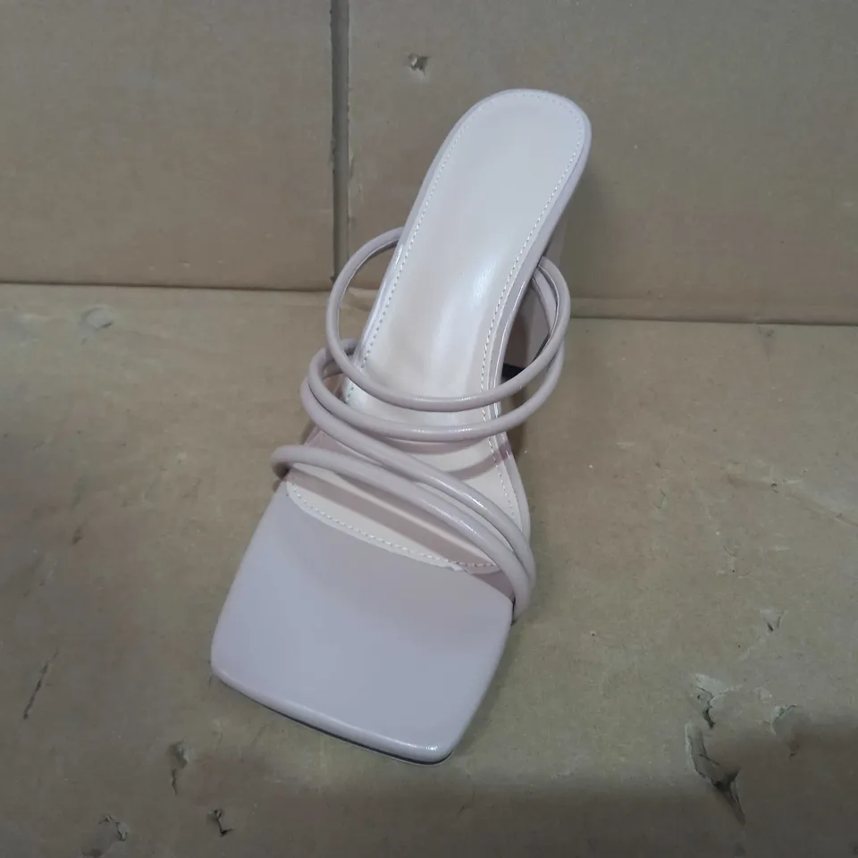 BOXED PAIR OF DESIGNER HEELS IN NUDE COLOUR EU SIZE 37