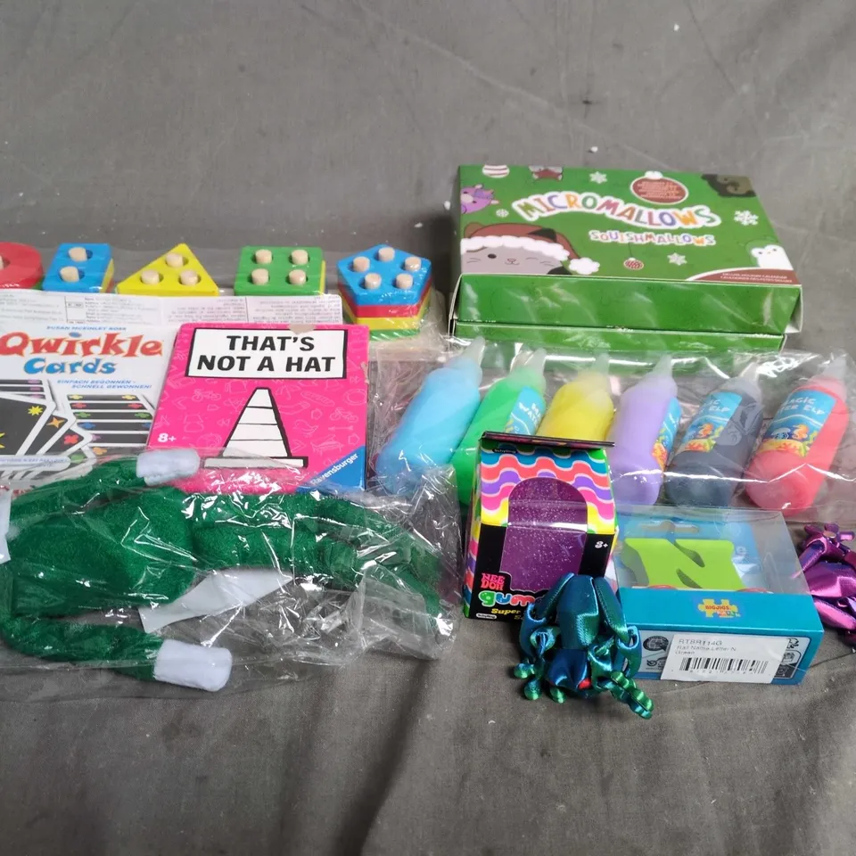 APPROXIMATELY 10 ASSORTED TOYS & GAMES PRODUCTS TO INCLUDE NAUGHTY ELF, PAINTS AND STACKING SHAPES