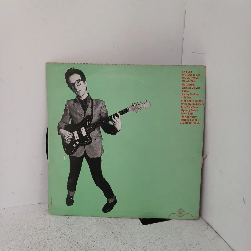 ELVIS COSTELLO – MY AIM IS TRUE LP (GREEN/BLACK ARTWORK)