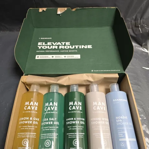 LOT OF 5 BOTTLES OF MANCAVE SHOWER GELS- ASSORTED SCENTS - 500ML PER BOTTLE