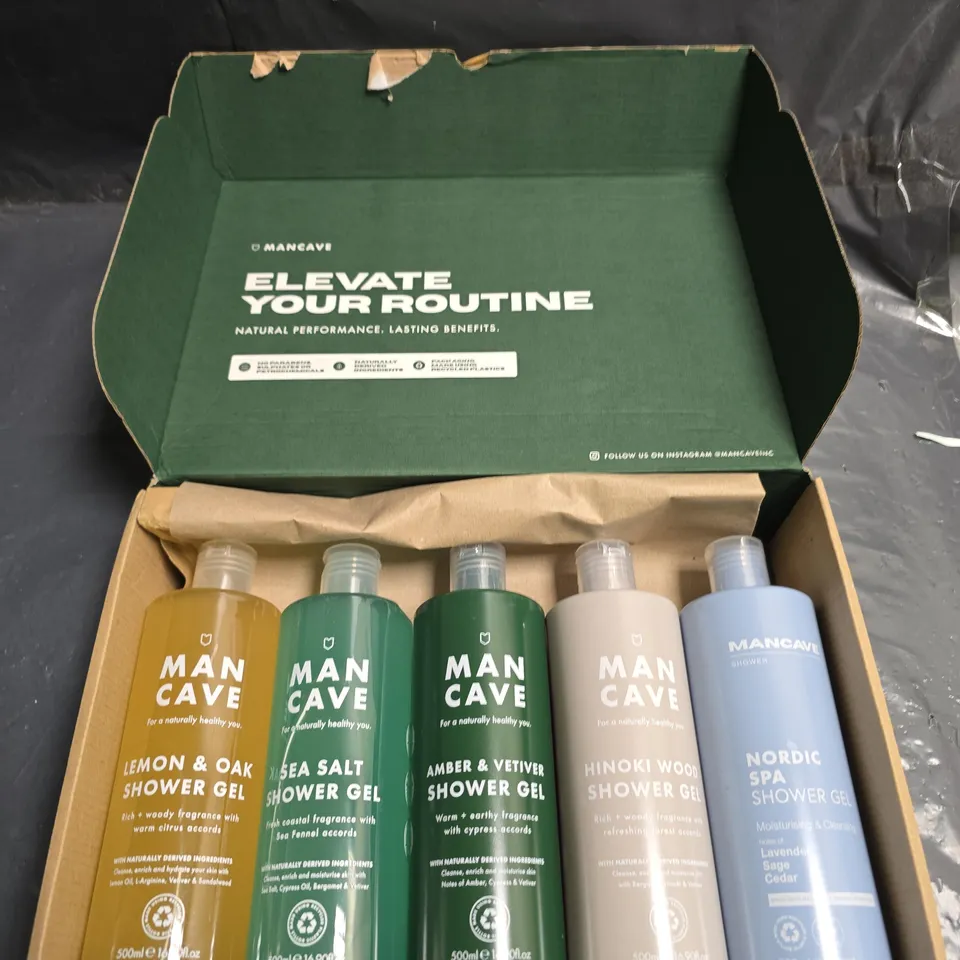 LOT OF 5 BOTTLES OF MANCAVE SHOWER GELS- ASSORTED SCENTS - 500ML PER BOTTLE