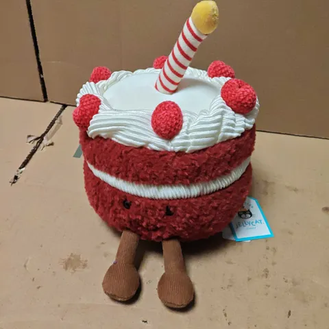 JELLYCAT CHERI CAKE PLUSH TOY – RED CAKE-SHAPED SOFT TOY WITH WHITE ICING