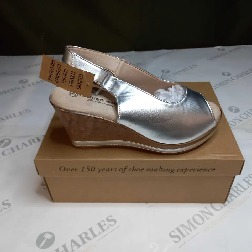 BOXED PAIR OF CUSHION WALK SILVER WEDGE HEELED SHOES - SIZE 3