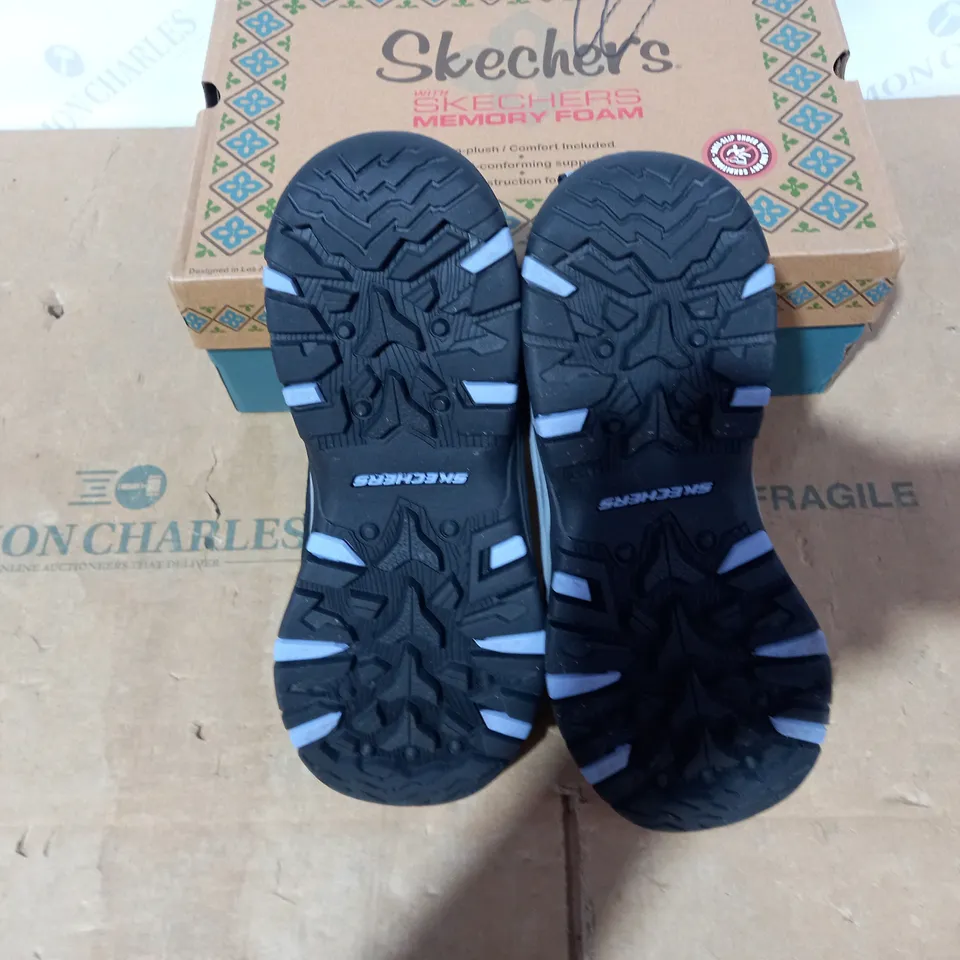 BOXED PAIR OF SKECHERS WALKING BOOTS- SIZE 7