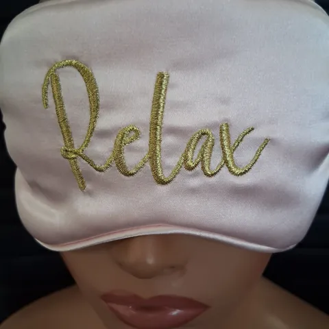 APPROXIMATELY 100 BRAND NEW 'RELAX' EYE MASKS