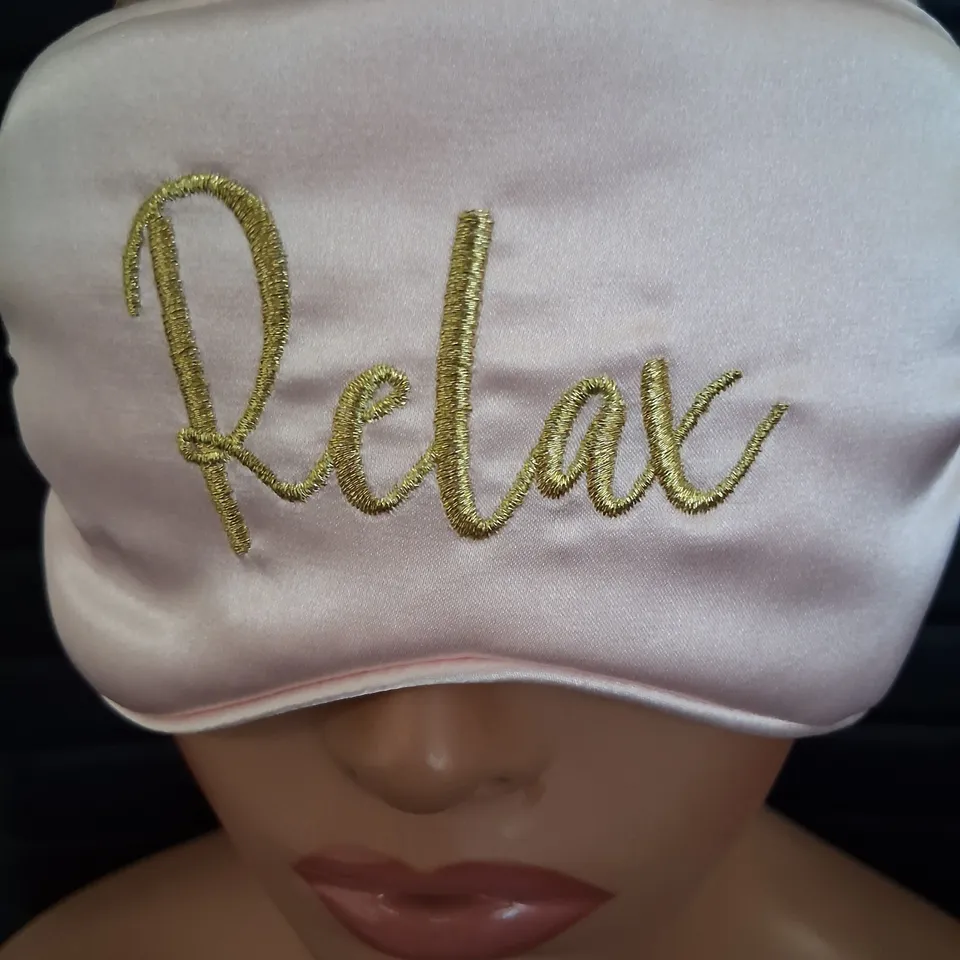 APPROXIMATELY 100 BRAND NEW 'RELAX' EYE MASKS