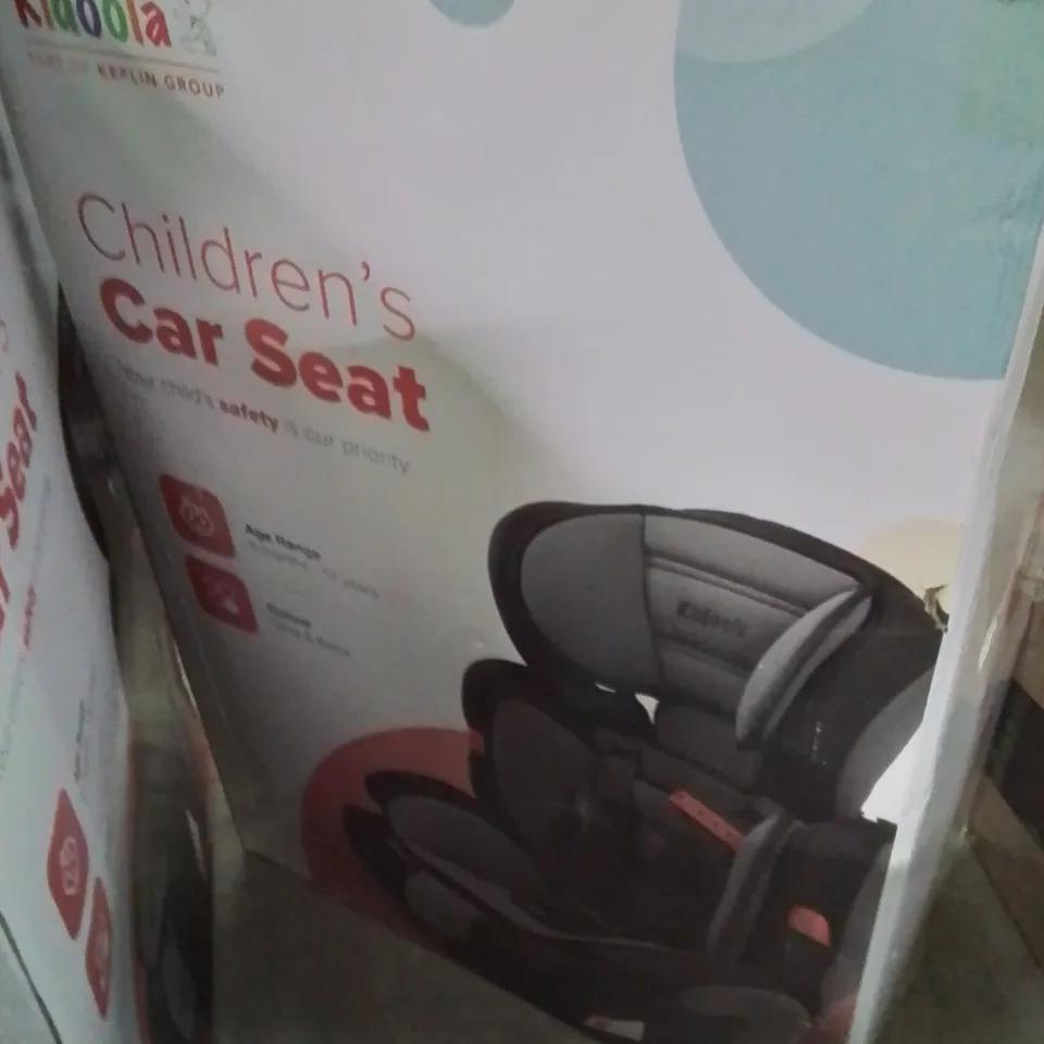 BOXED KIDOOLA CHILDREN'S CAR SEAT