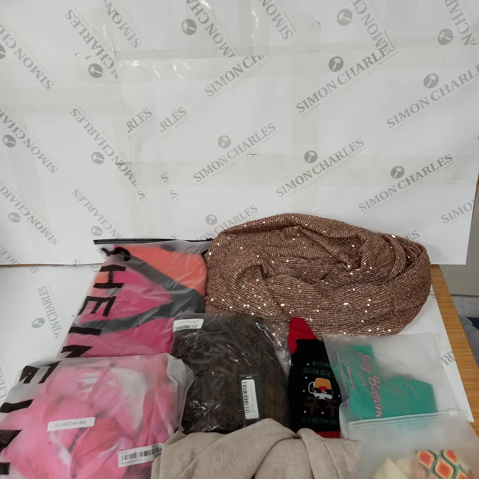 LARGE BOX OF ASSORTED CLOTHING ITEMS IN VARIOUS COLOURS AND SIZES INCLUDING TROUSERS , TOPS AND JUMPERS 