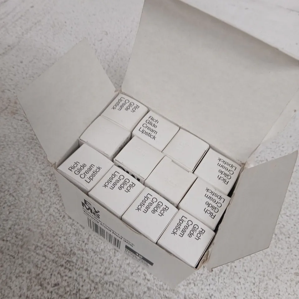A BOX OF 12 LIPSTICKS