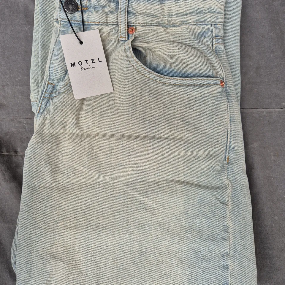 MOTEL LOW RISE JEANS IN ARCTIC BLUE SIZE 28/34