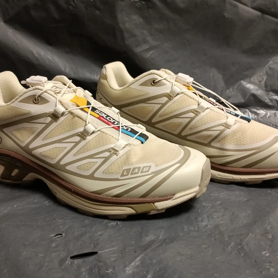PAIR OF SALOMON TRAINERS IN SAND SIZE UK 6.5