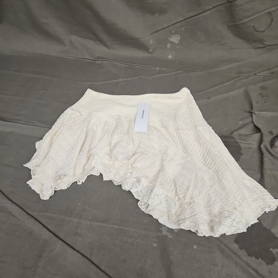 URBAN OUTFITTERS ASYMMETRICAL MINI SKIRT IN IVORY SIZE S