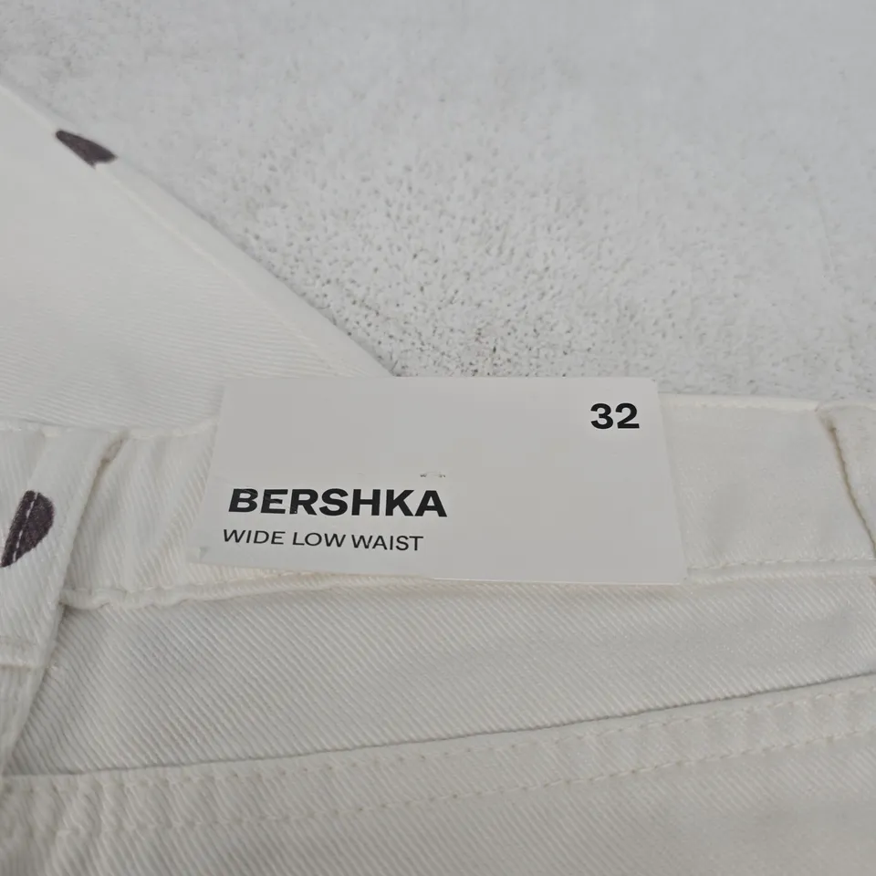 BERSHKA WHITE POLKA DOT JEANS – WIDE LOW WAIST, UK 32