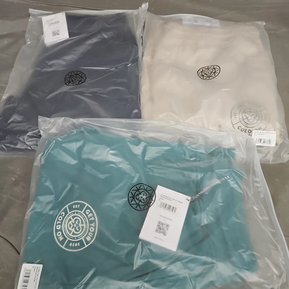 APPROXIMATELY 20 ASSORTED BAGGED CLOTHING ITEMS IN VARIOUS SIZES, STYLES & COLOURS TO INCLUDE MENS GET YOUR COLD ON SHORTS, UNISEX GET YOUR COLD ON JOGGERS, ETC