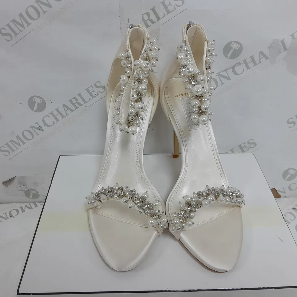 BOXED PAIR OF DUNE WIDE FIT BEADED ANKLE TRIM HEELS IN IVORY SATIN - SIZE 6