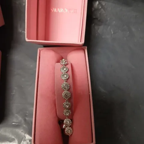 SWAROVSKI CLEAR CRYSTAL DISC LINK BRACELET – PINK PRESENTATION BOX