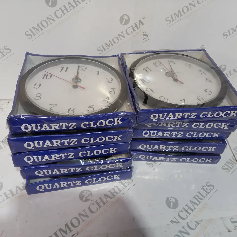 BOX OF APPROX 10 SMALL BLACK QUARTZ CLOCKS