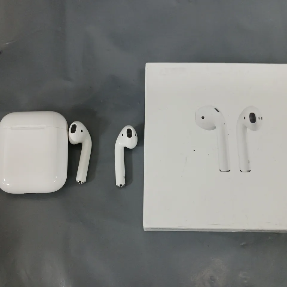 BOXED APPLE AIRPODS WITH CHARGING CASE 