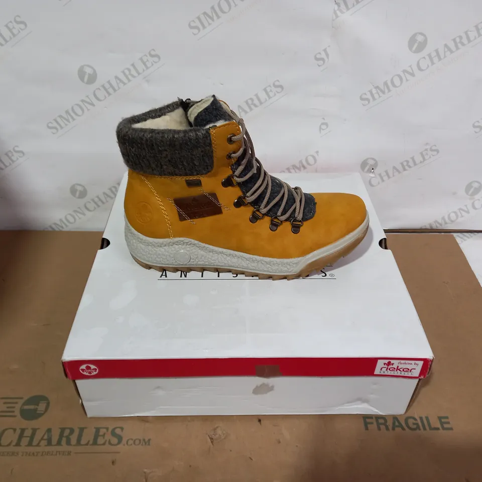 BOXED PAIR OF RIEKER BOOTS- SIZE 39