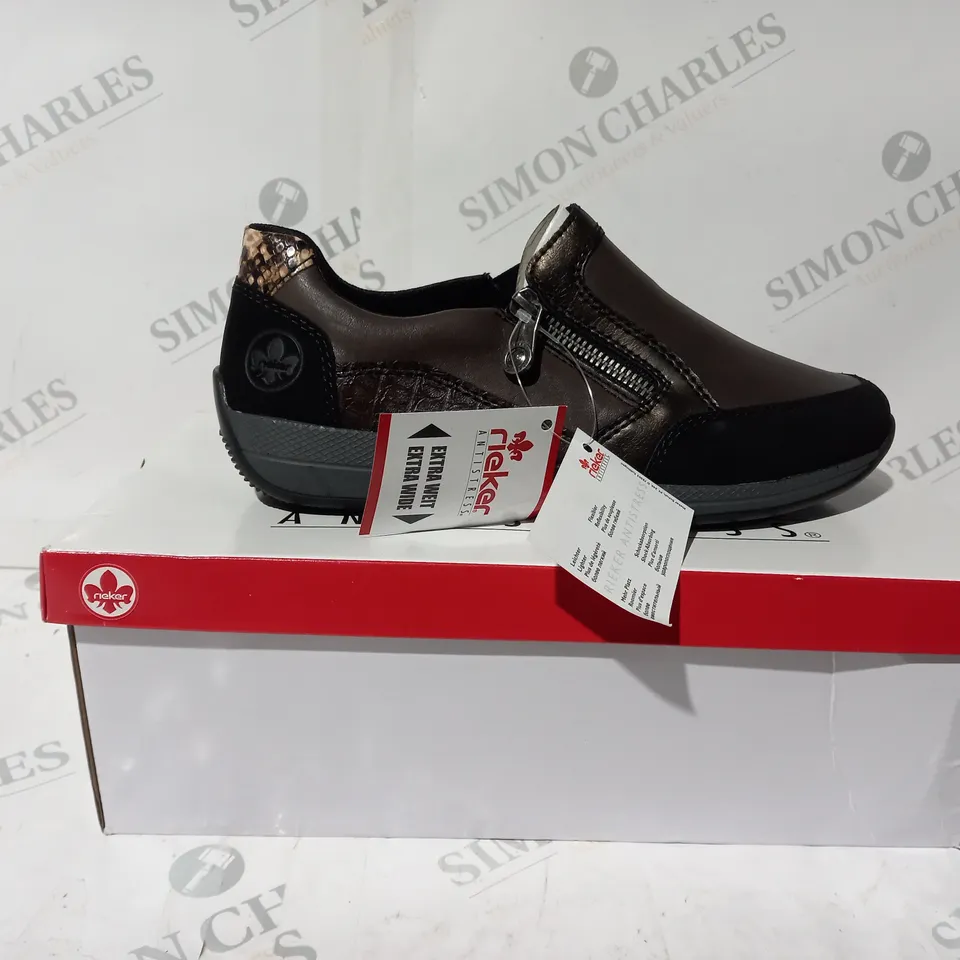 BOXED PAIR OF RIEKER TRAINER SHOES WITH ZIP IN BROWN UK SIZE 5
