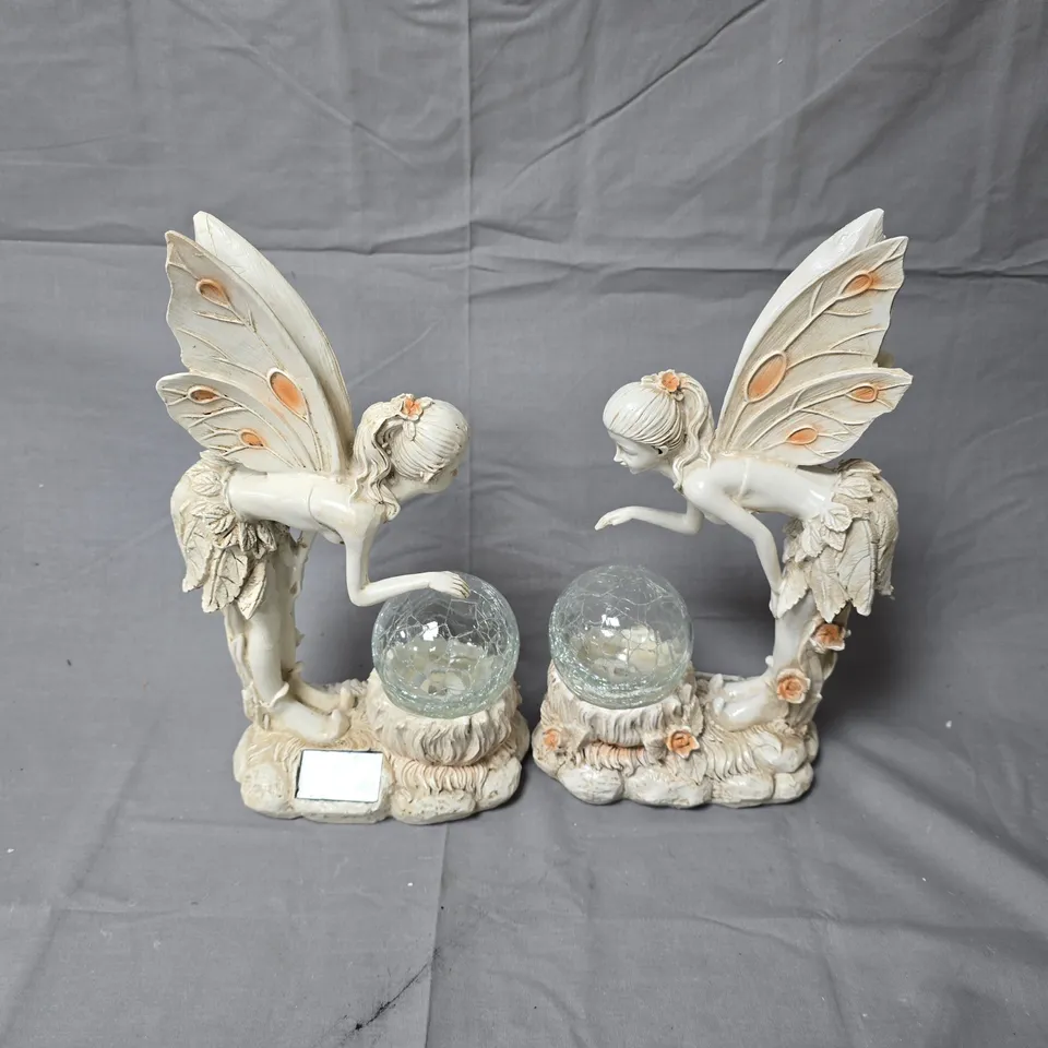 PAIR OF WHITE FAIRY GARDEN ORNAMENTS WITH CRACKLE GLASS GLOBES