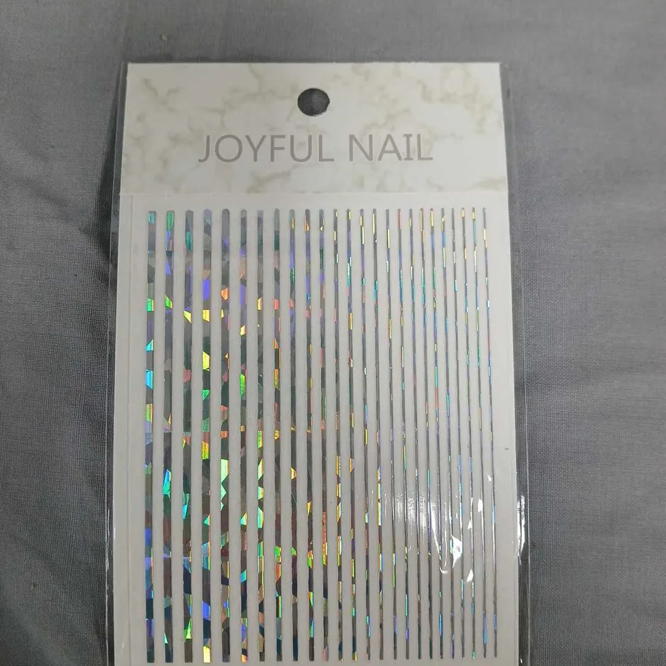BOX OF APPROXIMATELY 100 JOYFUL NAILS NAIL STICKERS