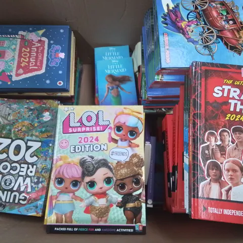 LARGE QUANTITY OF ASSORTED BOOKS AND 2024 ANNUALS TO INCLUDE GUINESS RECORDS 2024, MINECRAFT, DANDY AND STRANGER THINGS