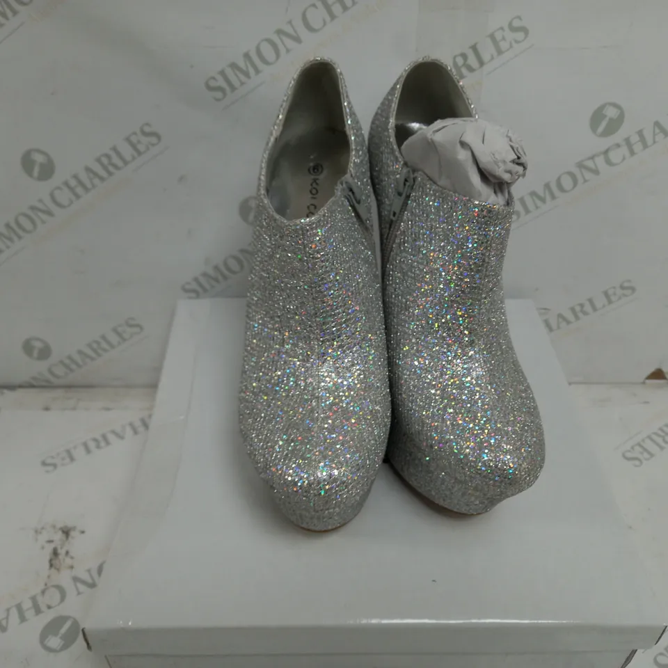 APPROXIMATELY 10 BRAND NEW BOXED PAIRS OF KOI COUTURE PLATFORM SHOES IN SILVER/SHIMMER TO INCLUDE SIZES 4, 5, 6
