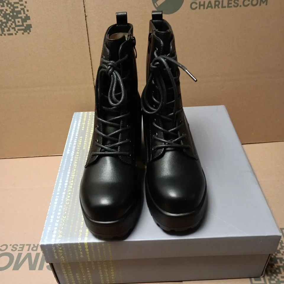 BOXED PAIR OF KOI GIN PLATFORM MILITARY BOOTS IN BLACK - SIZE 4