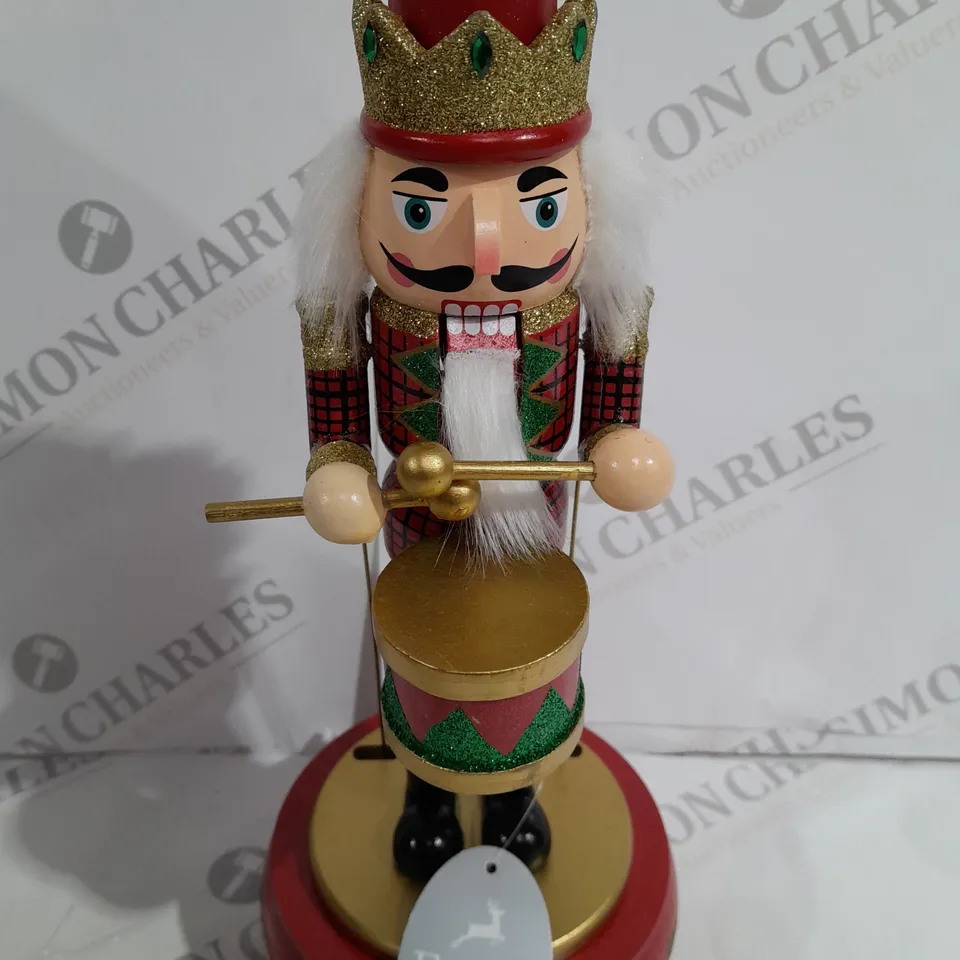 FESTIVE 32CM WOODEN ANIMATED MUSICAL NUTCRACKER