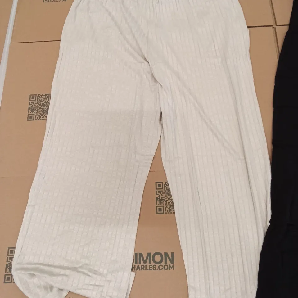 PALLET OF BRAND NEW WOMENS QUALITY DESIGNER CLOTHES APPROXIMATELY 125 TO INCLUDE; JACKETS, JUMPERS, PANTS ETC