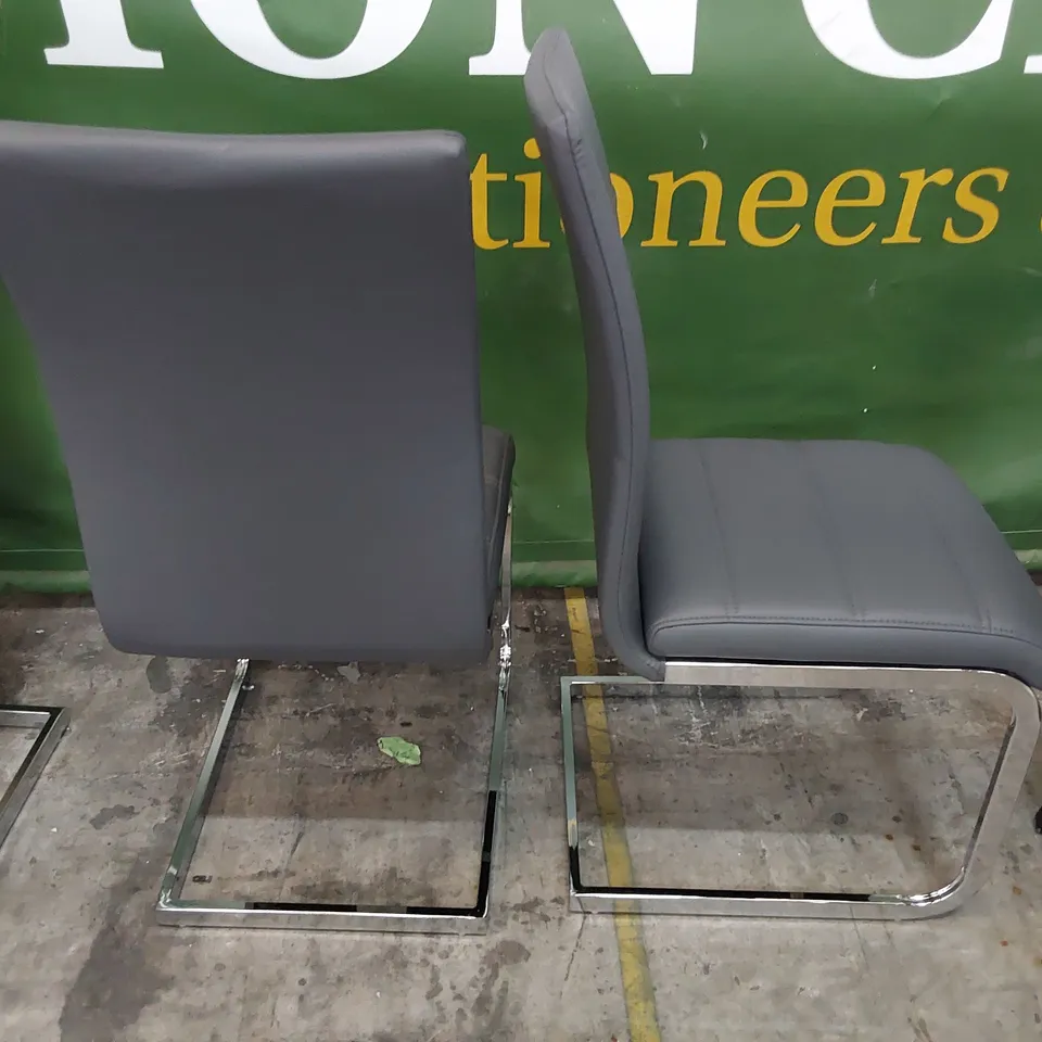 SET OF FOUR UPHOLSTERED DINING CHAIRS CHARCOAL PU ON CHROME FRAMES 