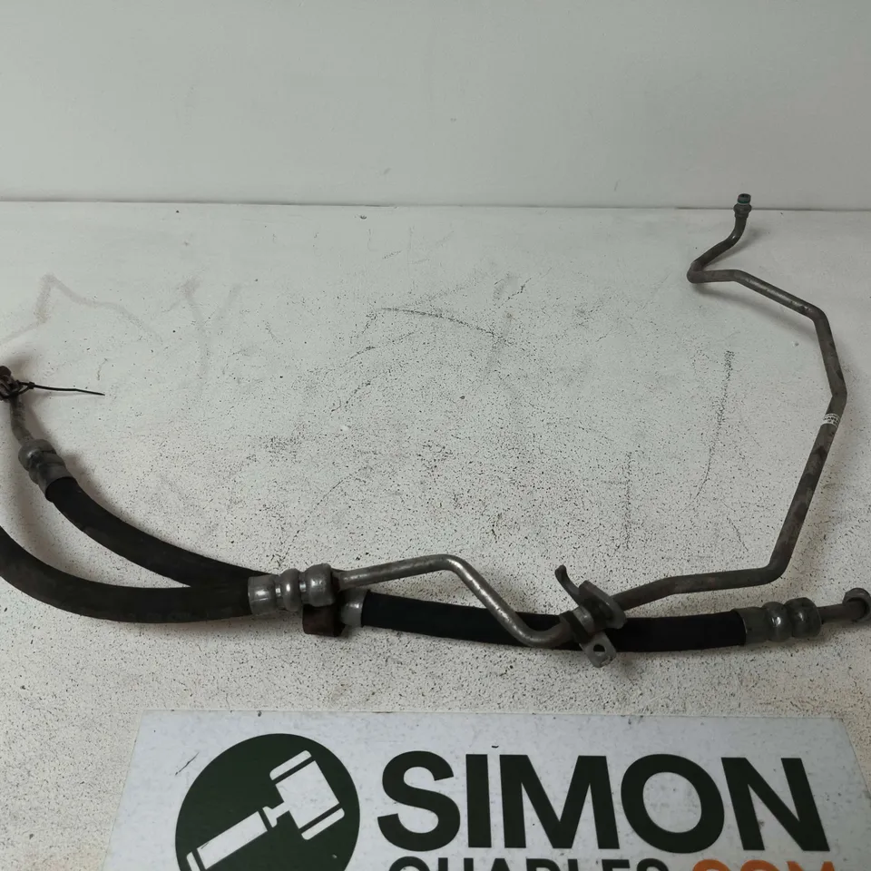 AUTOMOTIVE HOSE ASSEMBLY WITH METAL FITTINGS