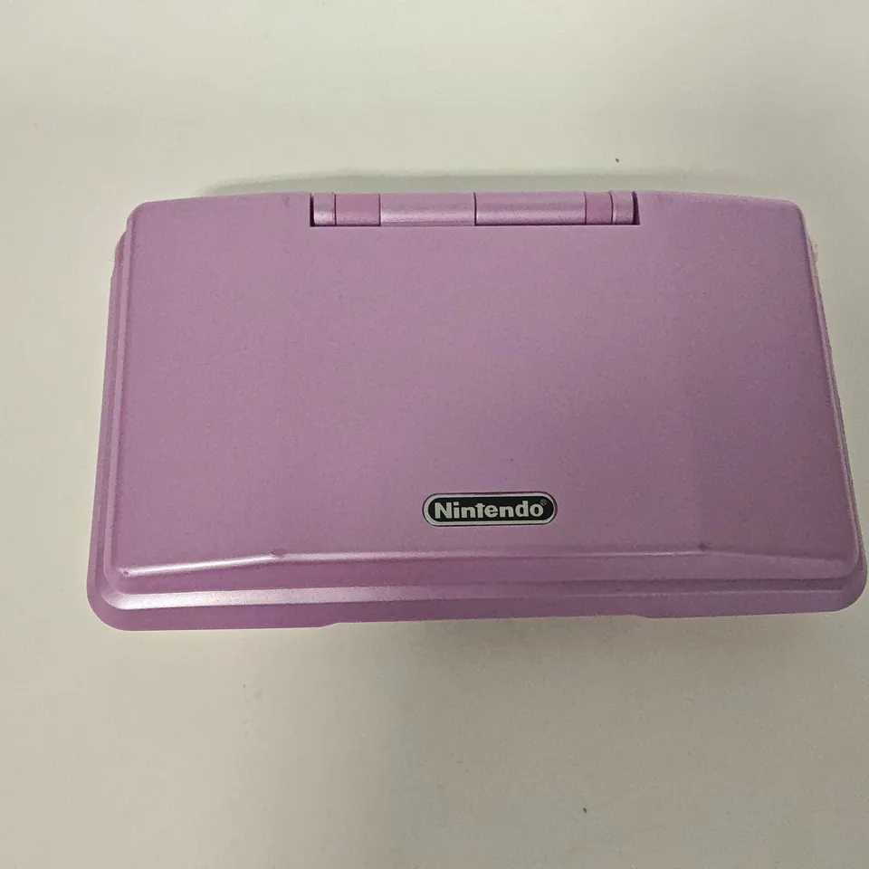 UNBOXED NINTENDO DS IN PURPLE/WHITE WITH SPYRO ADVENTURE - NTR-001