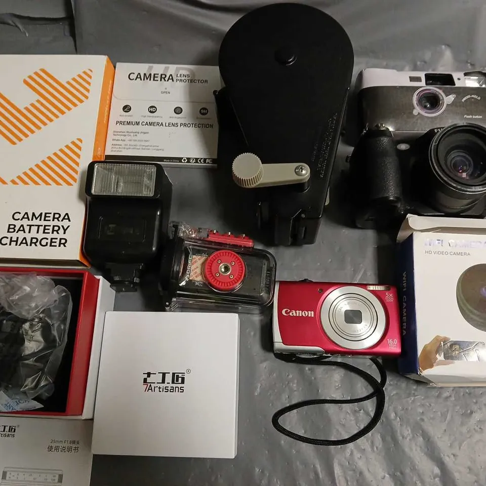 LOT OF 13 ASSORTED CAMERAS AND ACCESSORIES TO INCLUDE CHARGERS, FLASH AND CAMERAS