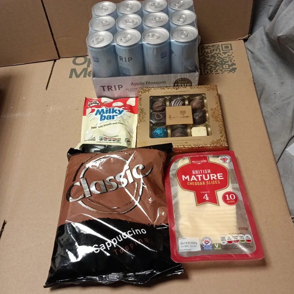 TOTE OF APPROXIMATELY 20 ASSORTED FOOD/DRINK ITEMS TO INCLUDE TRIP 12 PACK APPLE BLOSSOM, HOLDSWORTH CHOCOLATES, CLASSIC CAPPUCCINO TOPPING, MILKY BAR, CHEDDAR SLICES ETC