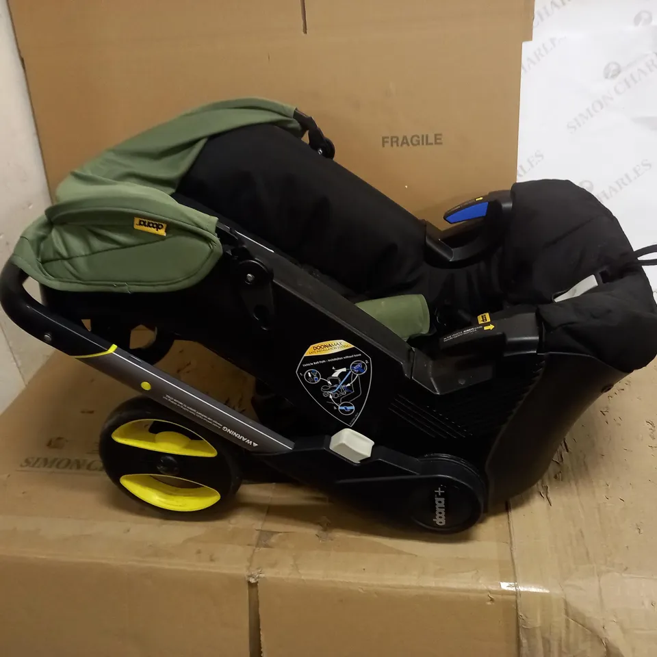 DOONA+ INFANT CAR SEAT & STROLLER - DESERT GREEN RRP £339.99