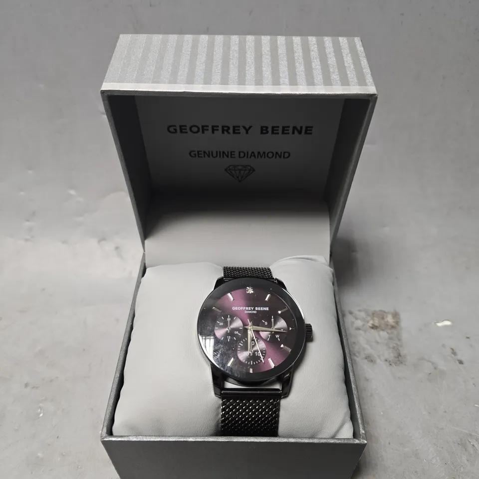 BOXED GEOFFERY BEENE PURPLE DIAL CHRONOGRAPH WATCH 