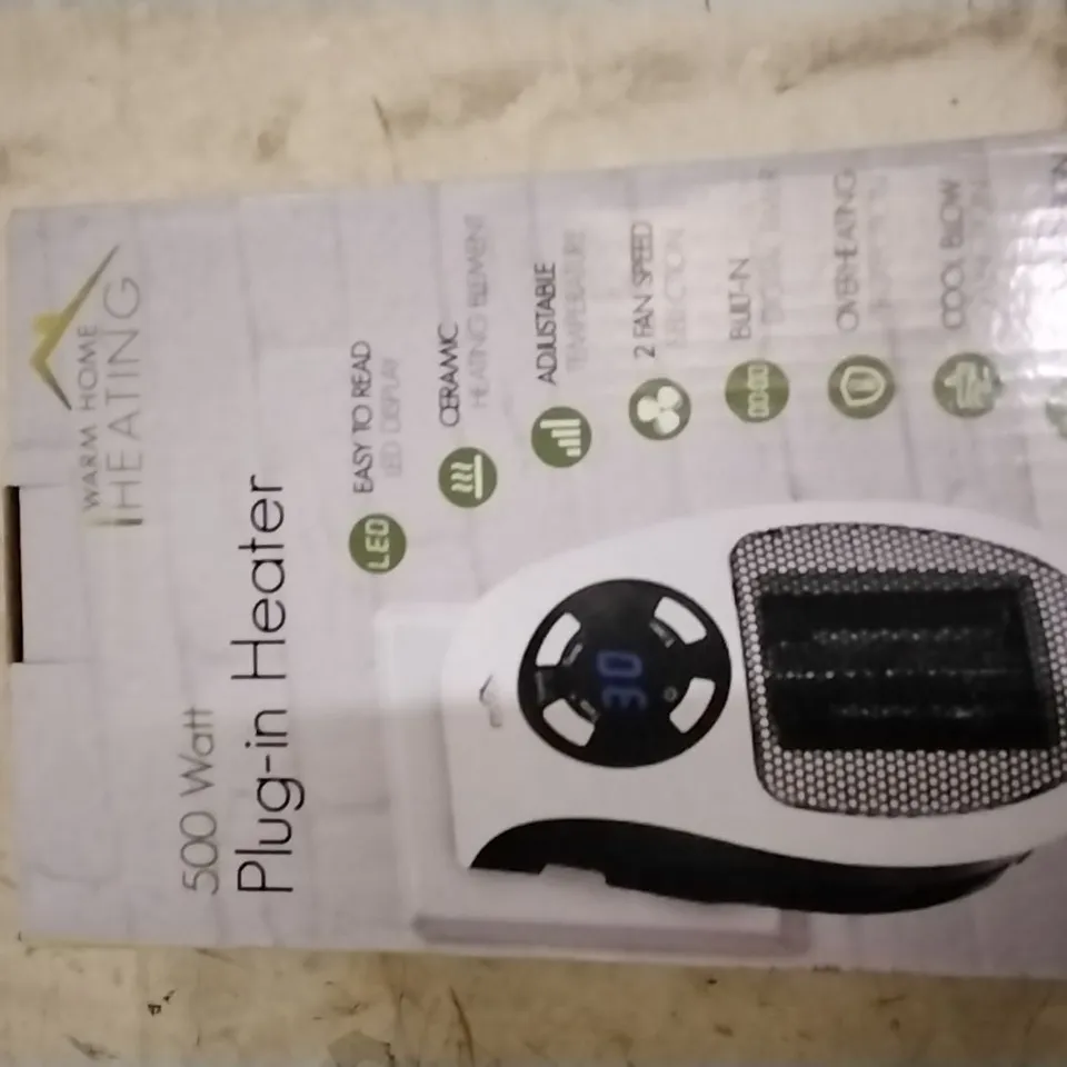 WARM HOME CERAMIC PLUG IN HEATER