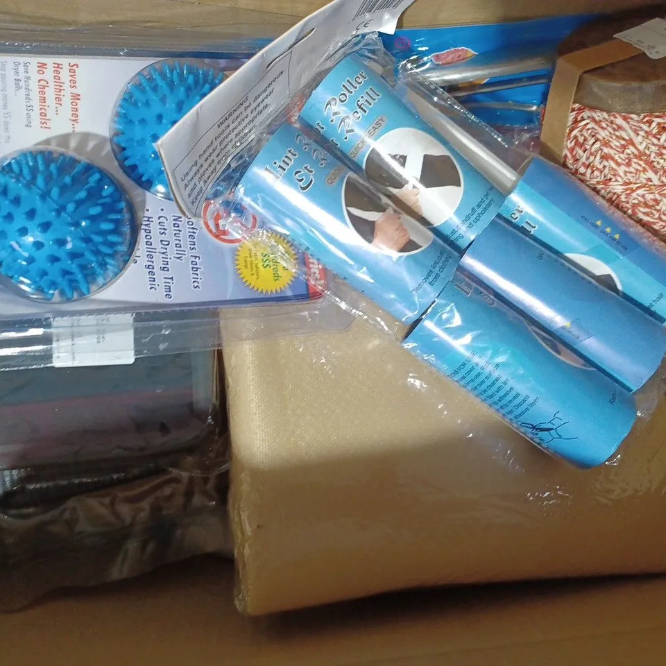 BOX OF APPROXIMATELY 10 ASSORTED HOUSEHOLD ITEMS TO INCLUDE LINT ROLLER, DECORATIVE RIBBON, DRYER BALLS, ETC