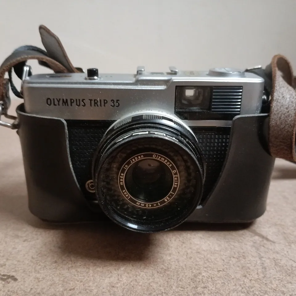 OLYMPUS TRIP 35 35MM FILM CAMERA WITH LEATHER HALF-CASE