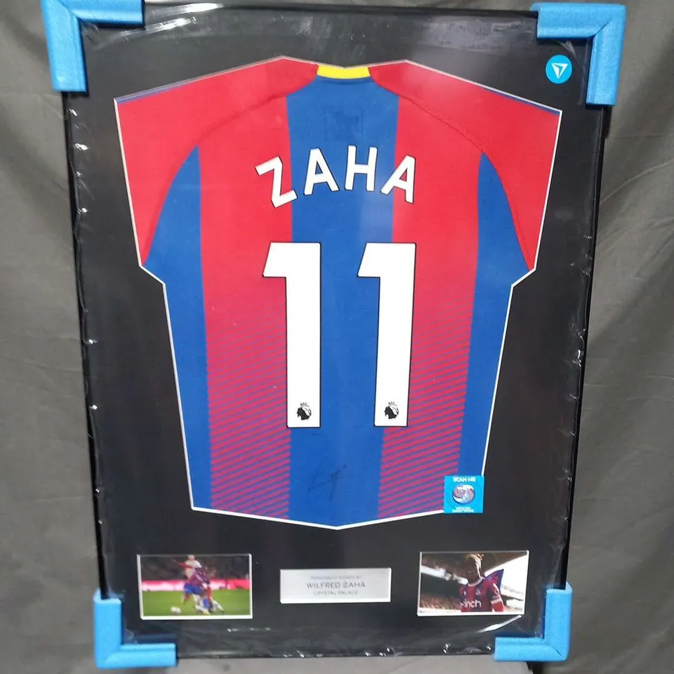 FRAMED WILFRED ZAHA CRYSTAL PALACE JERSEY PERSONALLY SIGNED WITH CERTIFICATE OF AUTHENTICITY FROM THE VAULT