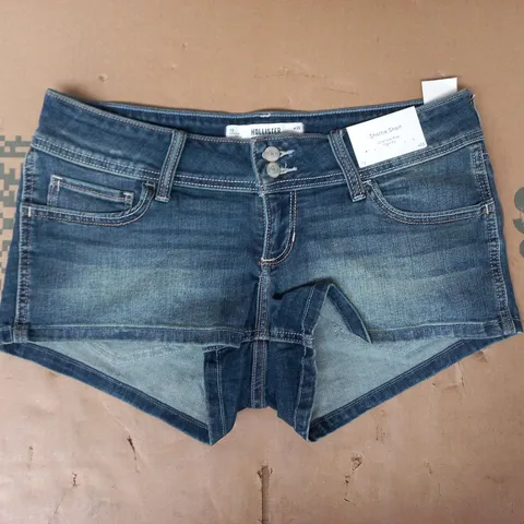 HOLLISTER ULTRA LOW RISE SHORTIE SHORTS IN DENIM BLUE SIZE 10 (W30)