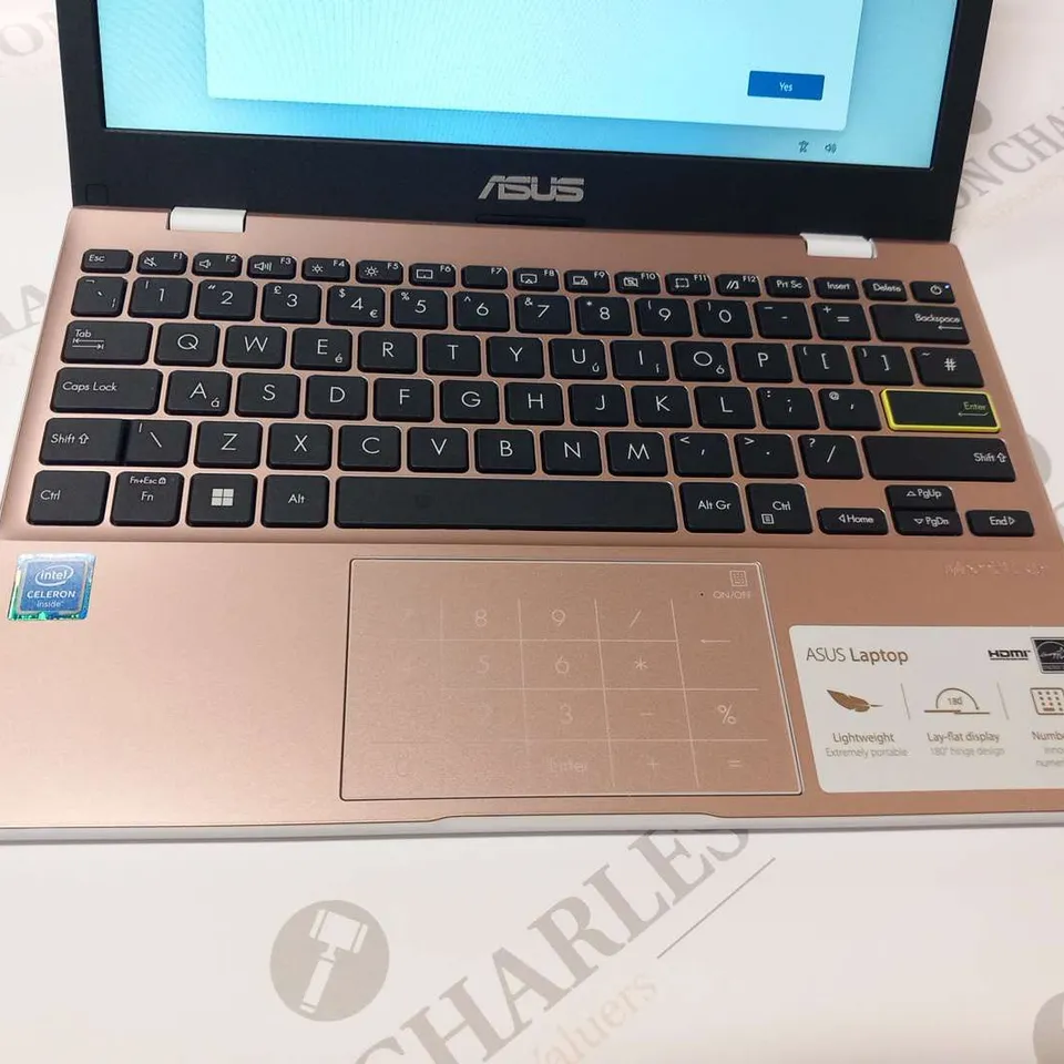 BOXED ASUS E210M NOTEBOOK SONICMASTER