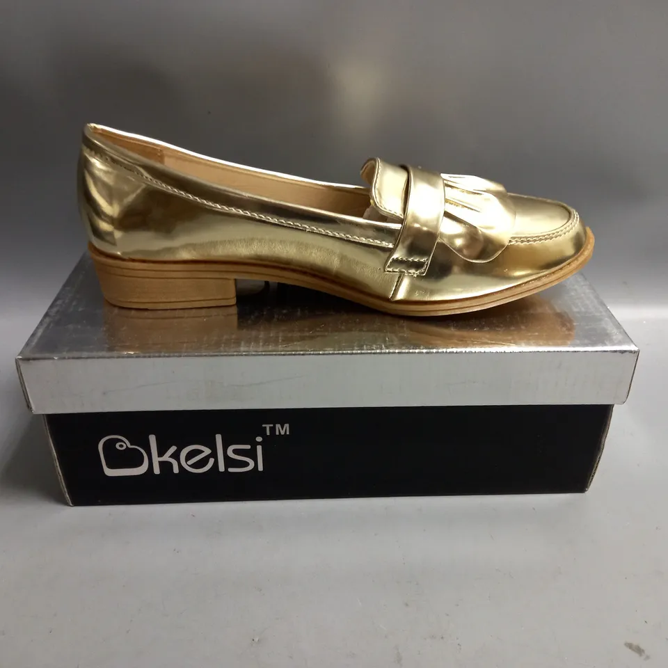BOXED KELSI LADIES FLAT GOLD BROGUES. SIZE 4