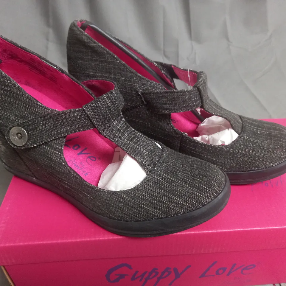 BOX OF APPROXIMATELY 12 BLACK  GUPPY LOVE BY BLOWFISH SHOES IN VARIOUS SIZES 