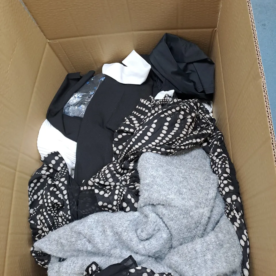 LARGE BOX OF ASSORTED CLOTHING ITEMS IN VARIOUS COLOURS AND SIZES INCLUDING TROUSERS , TOPS AND JUMPERS 