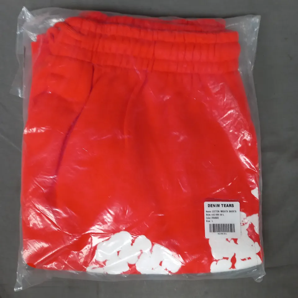 DENIM TEARS COTTON WREATH SHORTS IN ORANGE SIZE LARGE