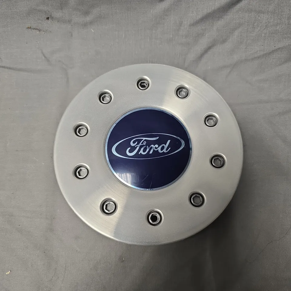 4 X FORD BRANDED WHEEL COVERS 